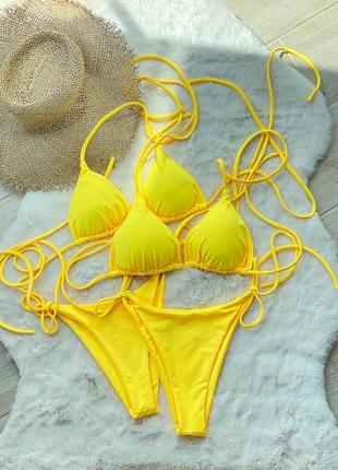 Желтый купальник бикини с завязками3 фото