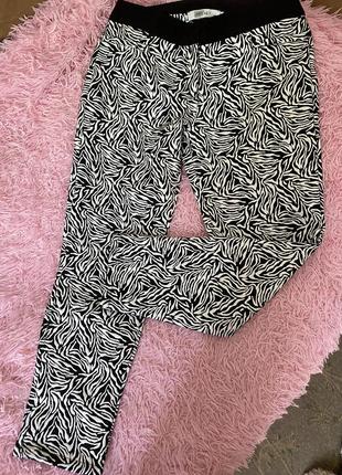 Брюки жіночі в анімалістичному принті