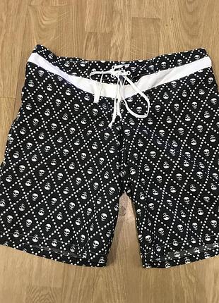 Плавальні шорти