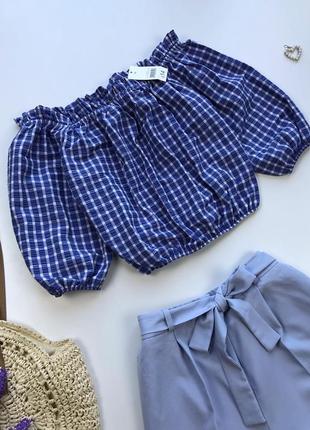 Блуза в клітинку з відкритими плечима