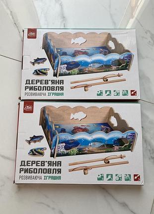 Дерев’яна іграшка рибалка