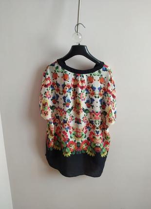 Розкішна дизайнерська блуза в квітковий принт5 фото