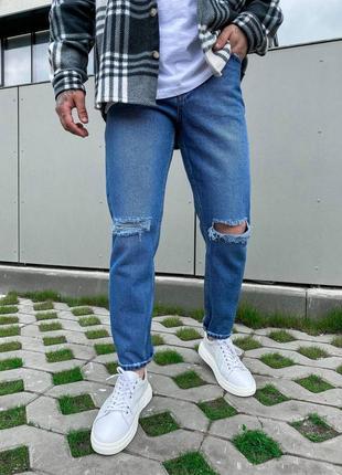 Чоловічі джинси з рваними колінами сині1 фото