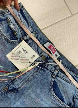 Крутейшие брендовые джинсы,порез и паетки на колене,люкс качество.2 фото