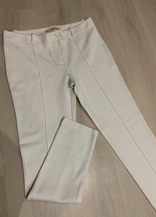 Білі штани вузькі штани молочні штани завужені брюки