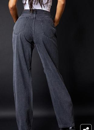 Потертые черные рваные джинсы-бойфренды baggy с низкой посадкой