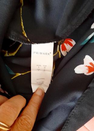 🔥актуальна  блузка у квітковий принт ззаду бантики  primark2 фото