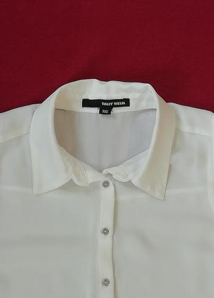 Біла прозора сорочка з прорізами на спині5 фото