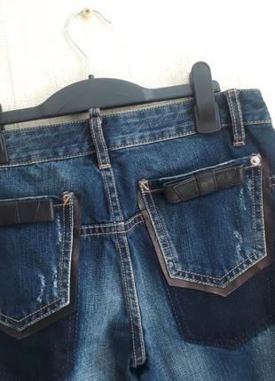 Оригинальные джинсы dsquared со смещенными карманами и кожаными бантами размер 386 фото