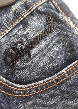 Оригінальні джинси dsquared зі зміщеними кишенями і шкіряними бантами розмір 388 фото