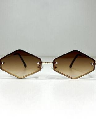 Солнцезащитные очки без оправы коричневые унисекс1 фото