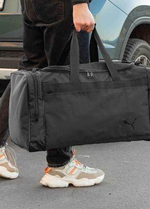 Чоловіча дорожня спортивна сумка puma fat чорна тканинна для тренувань на 60 літра спортзалу