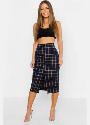Спідниця міді в клітинку