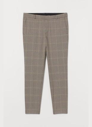 Чоловічі штани в клітинку