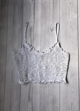 Білий топ в горошок з жатой тканини м