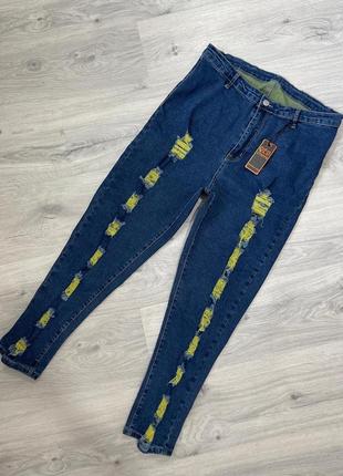 Крутые рваные джинсы1 фото