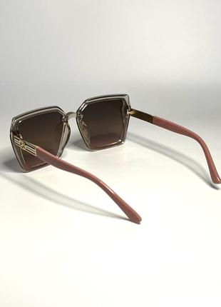 Сонцезахисні окуляри жіночі пудрові3 фото