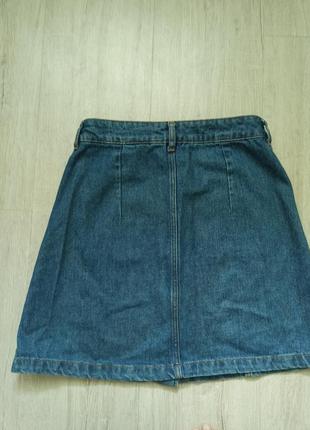 Джинсовая юбка с пуговицами карманы спереди3 фото