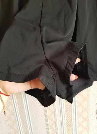 Стильный нарядный комбинезон шортами, чёрный комбез в пайетках, короткий ромпер без брителек4 фото