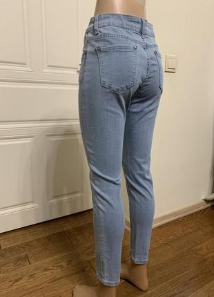 Жіночі світлі джинси з потертостями6 фото