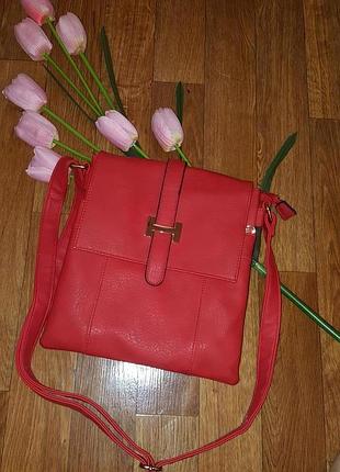 Продам классную сумку планшетку красного цвета