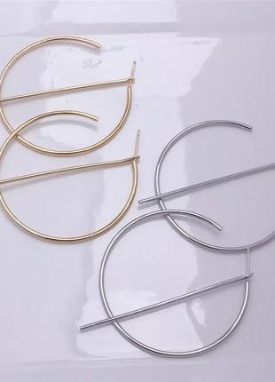 Вечірні сережки кільця трендові геометричні золотисті сережки2 фото