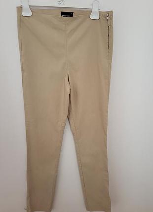 Бежові штанці на замочках