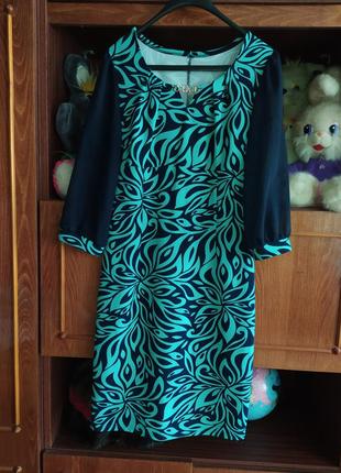 Шикарное женское бирюзовое платье с красивым орнаментом1 фото