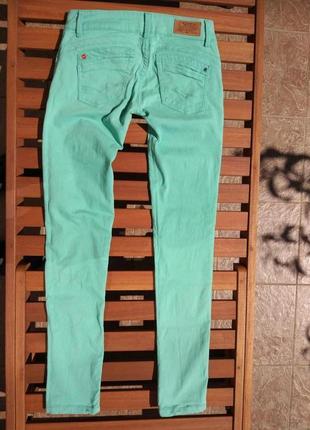 Зелёные джинсы бедровки2 фото