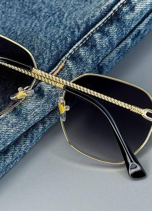 Солнцезащитные унисекс очки в металической оправе3 фото