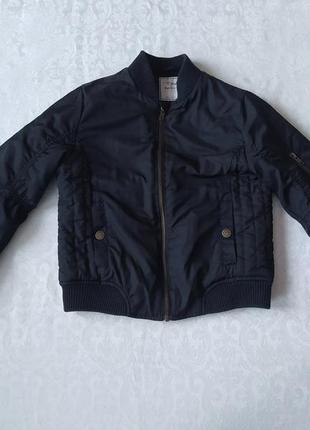 Тепла куртка next