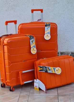 Яркий прочный чемодан  mcs turkey 🇹🇷  из  полипропилена  оранжевый1 фото
