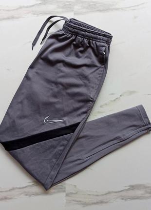 Круті, оригінальні, звужені спортивні штани від nike