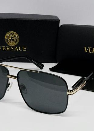 Versace стильні чоловічі сонцезахисні окуляри чорні з золотом