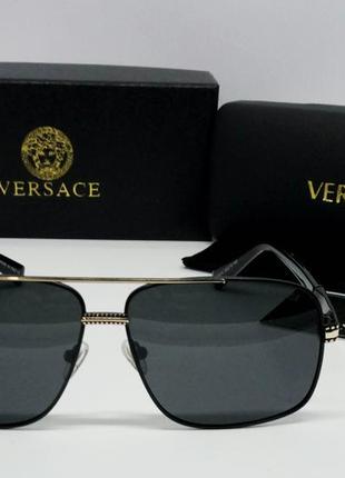 Versace стильные мужские солнцезащитные очки черные с золотом2 фото