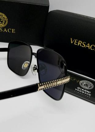 Versace стильные мужские солнцезащитные очки черные с золотом8 фото