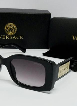 Versace жіночі сонцезахисні окуляри чорні з золотим лого