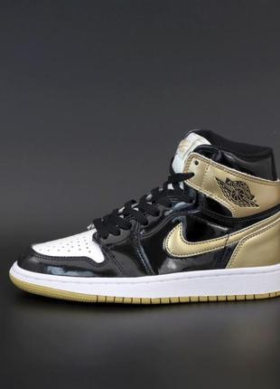 Женские кроссовки nike air jordan 1 mid black gold 37-382 фото