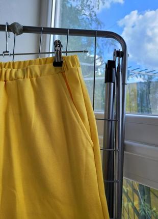 Костюм трикотажный желтый кардиган+штаны3 фото