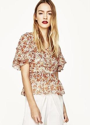 Шифоновий топ з квітковим принтом та воланами