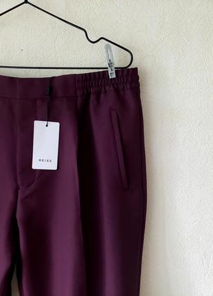 Люксовые новые зауженные брюки с подворотами reiss р 348 фото