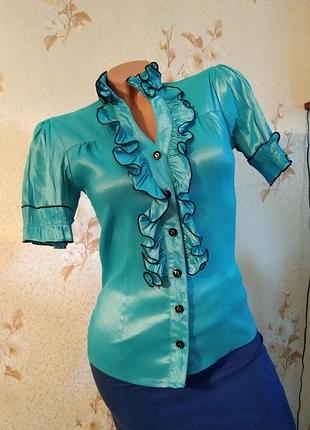 Блузка голубая