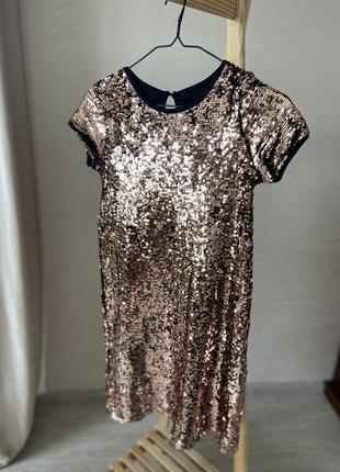 Золотисту сукню в паетках1 фото