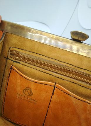 Винтажная сумка клатч north-bag finland из оранжеаой кожи с внутренним карманом на молнии.4 фото