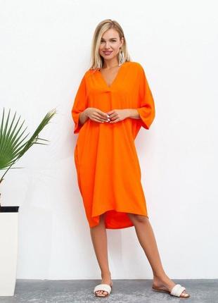 Оранжевое свободное платье с v-образной горловиной