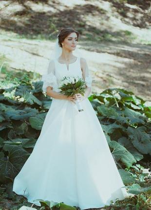 Весільна дизайнерська сукня колір айворі р. хс-з атлас1 фото