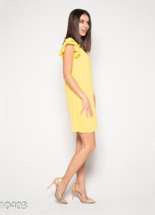 Жовта міні сукня з рюшами на рукавах2 фото