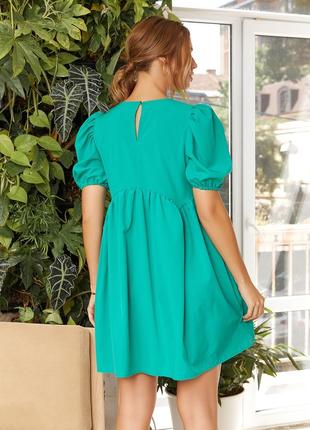 Зелена сукня з фігурною поличкою3 фото