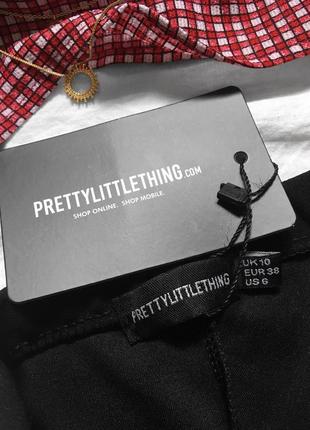 Стильні чорні шорти з воланом від prettylittlething6 фото