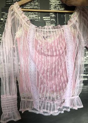 Стильна красива рожева прозора блуза